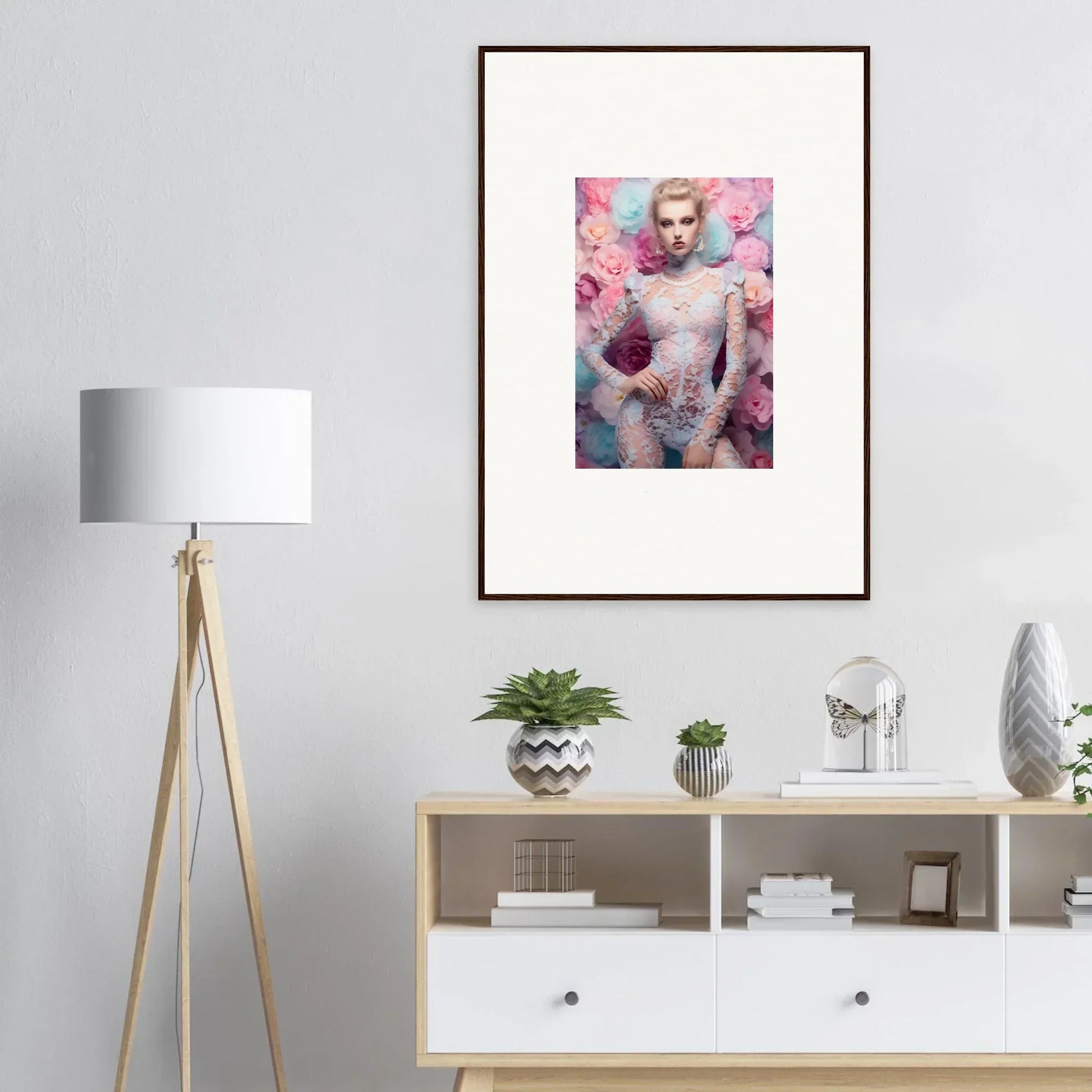 Framed portrait of a person surrounded by pink floral elements.