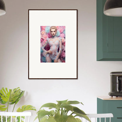 Framed artwork depicting a person surrounded by pink floral elements.