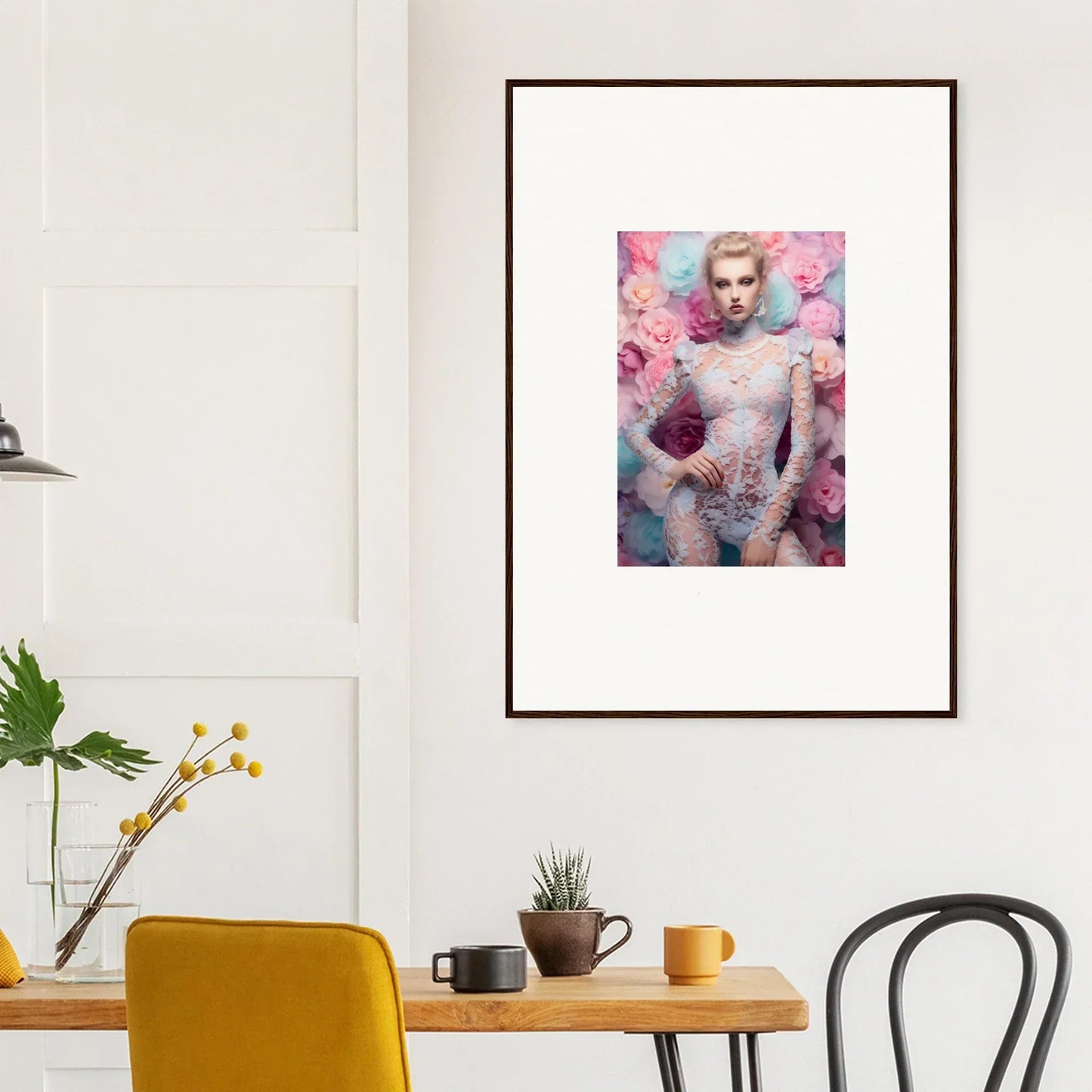 Framed portrait photograph of a person surrounded by pink flowers.