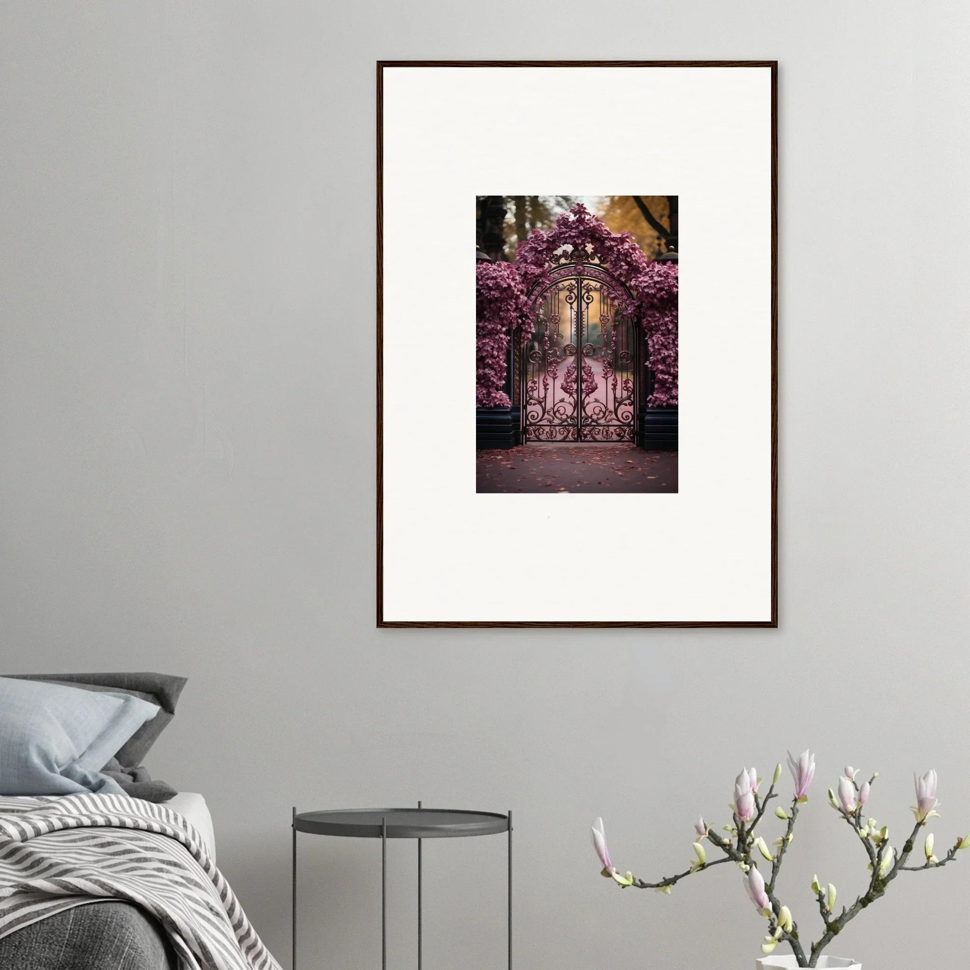 Framed wall art of an ornate gate with pink cherry blossoms for Prāt Butterfly Turntables