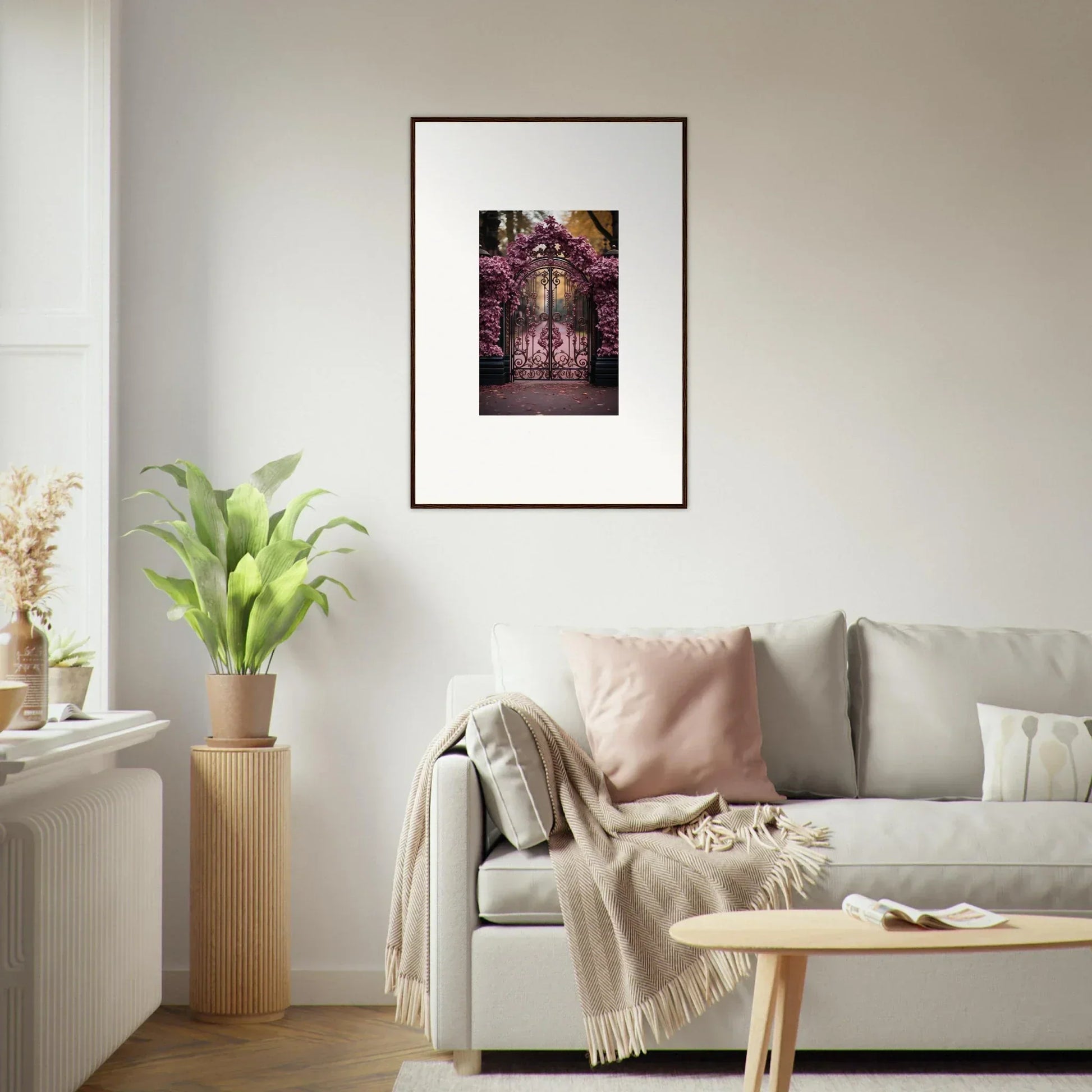 Framed wall art of a pink cherry blossom path above Prāt Butterfly Turntables