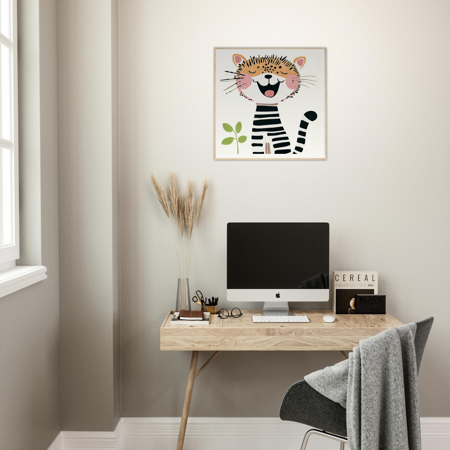 Minimalist home office with wooden desk, iMac, and whimsical tiger nursery wall art