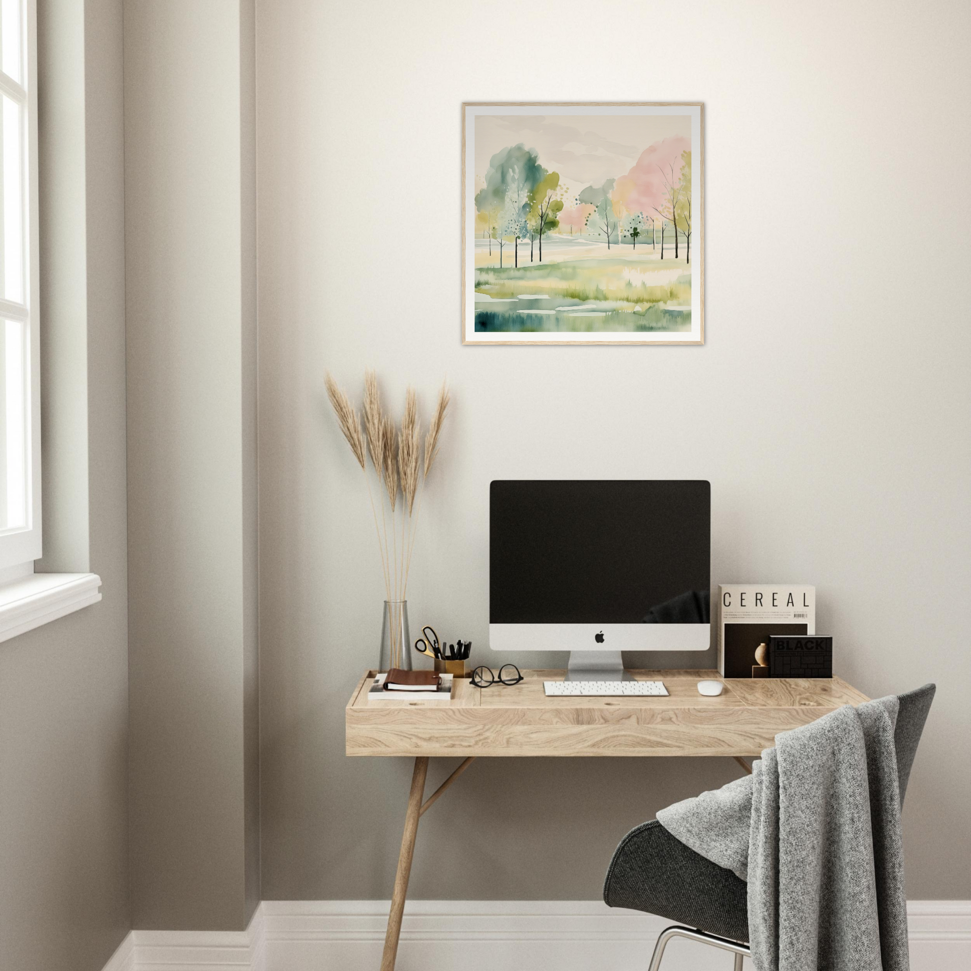 Minimalist wooden desk with iMac, perfect for nursery decor and framed poster setup