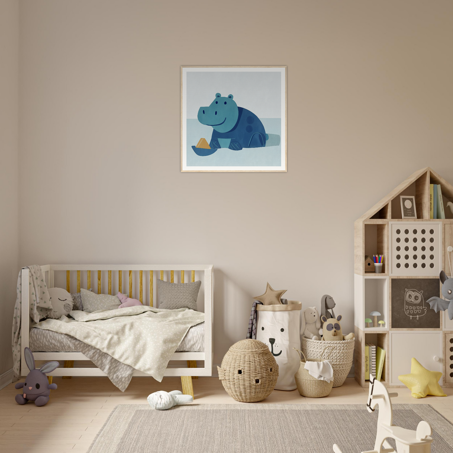 Cozy nursery decor with neutral tones and cute hippo nursery wall art above the crib