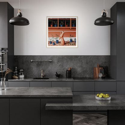 Modern dark gray kitchen featuring industrial pendant lights and colorful nursery wall art