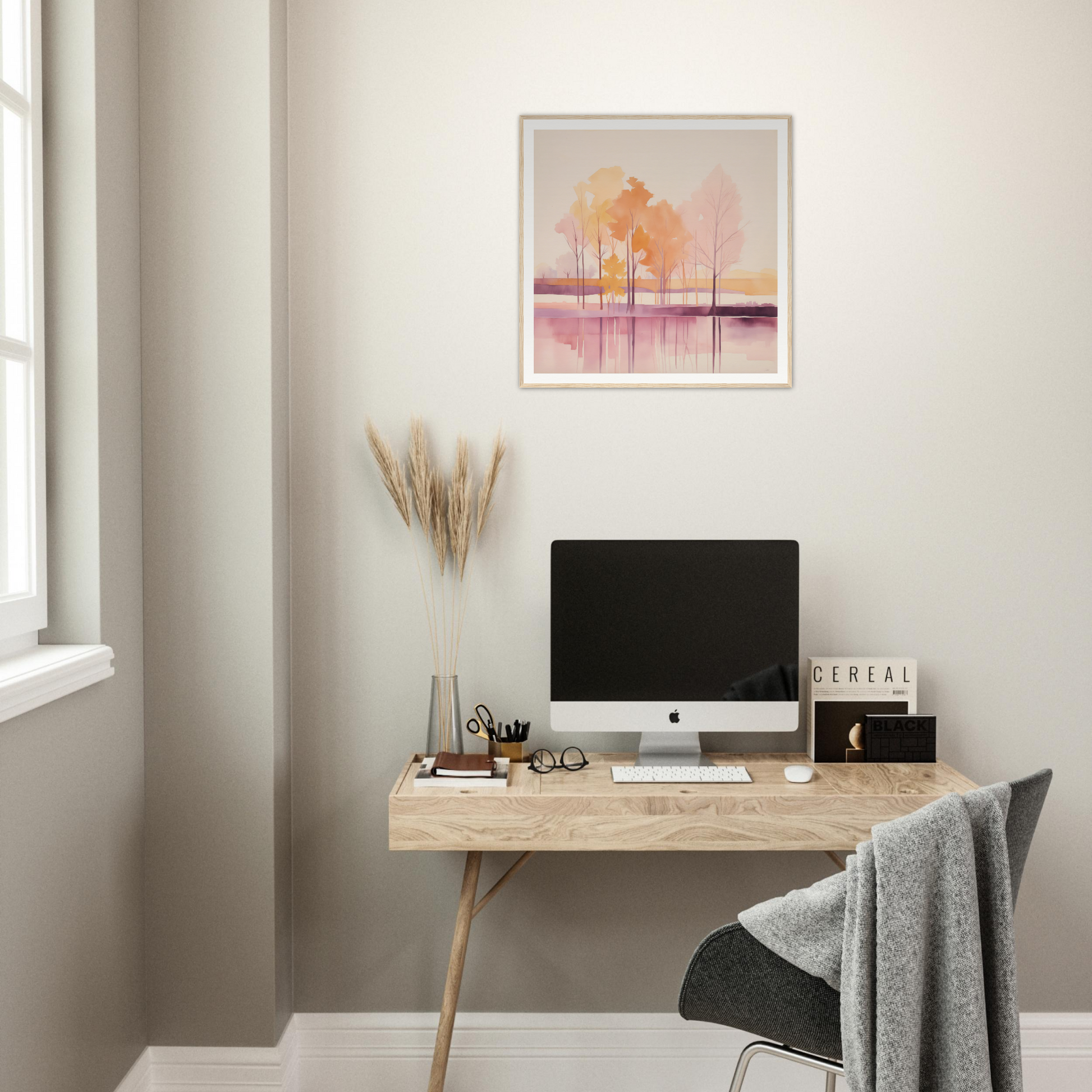 Wooden desk with iMac and minimalist decor perfect for nursery wall art vibes