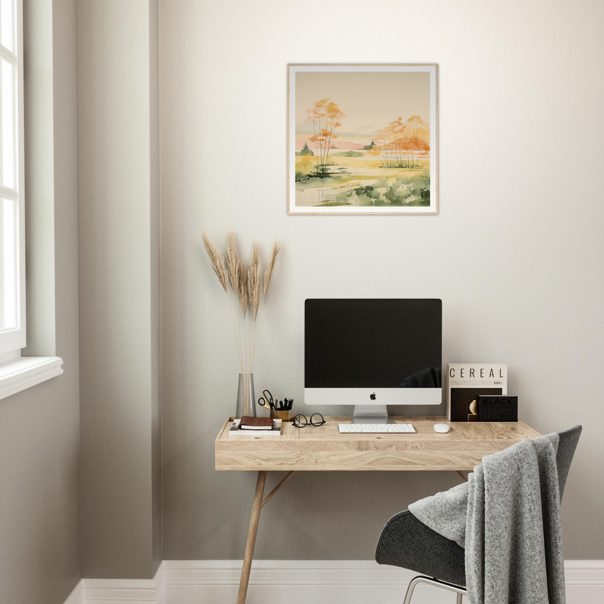 Minimalist wooden desk with iMac and nursery wall art above for stylish decor