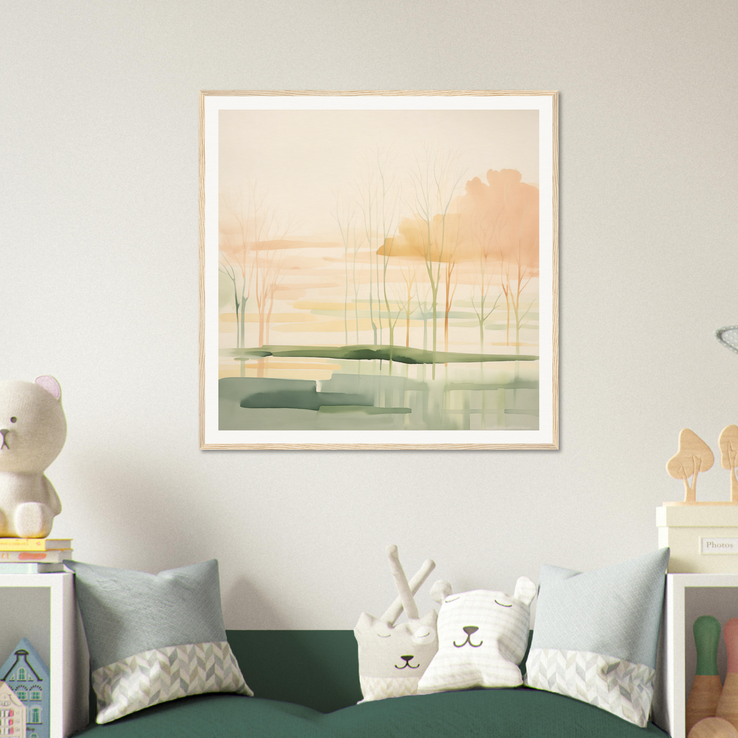 Framed watercolor nursery wall art featuring a misty landscape in sage and peach tones