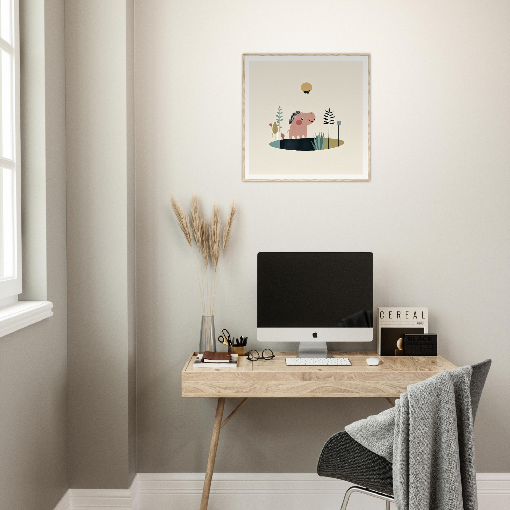 Minimalist wooden desk with iMac, perfect for stylish nursery wall art and decor