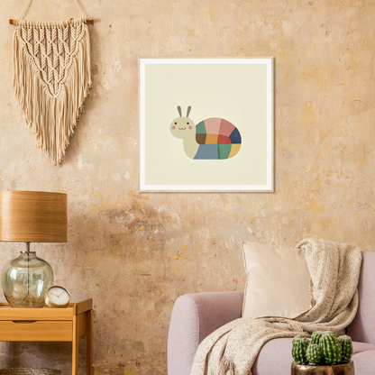 Colorful geometric snail artwork in a white frame for nursery wall art decor