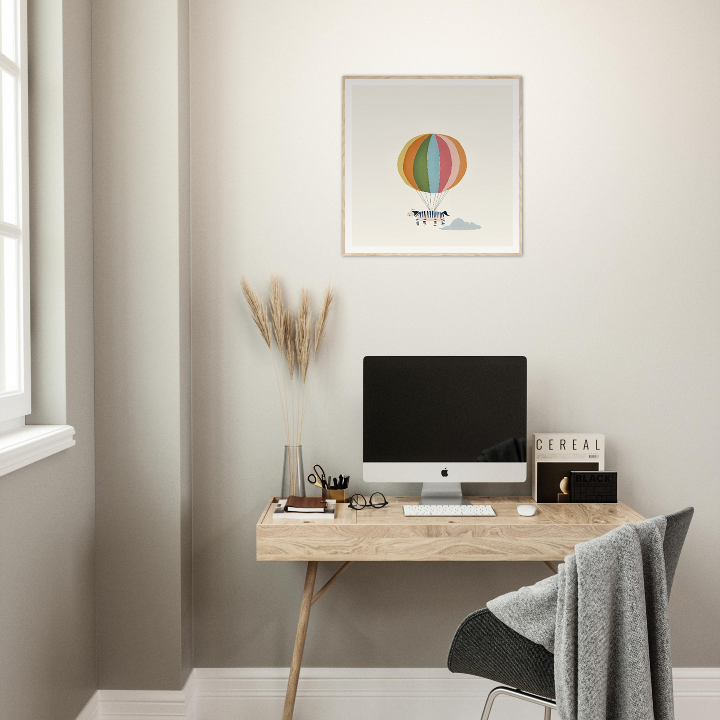 Minimalist wooden desk with iMac and framed canvas art above Psychedelic Airborne Menagerie