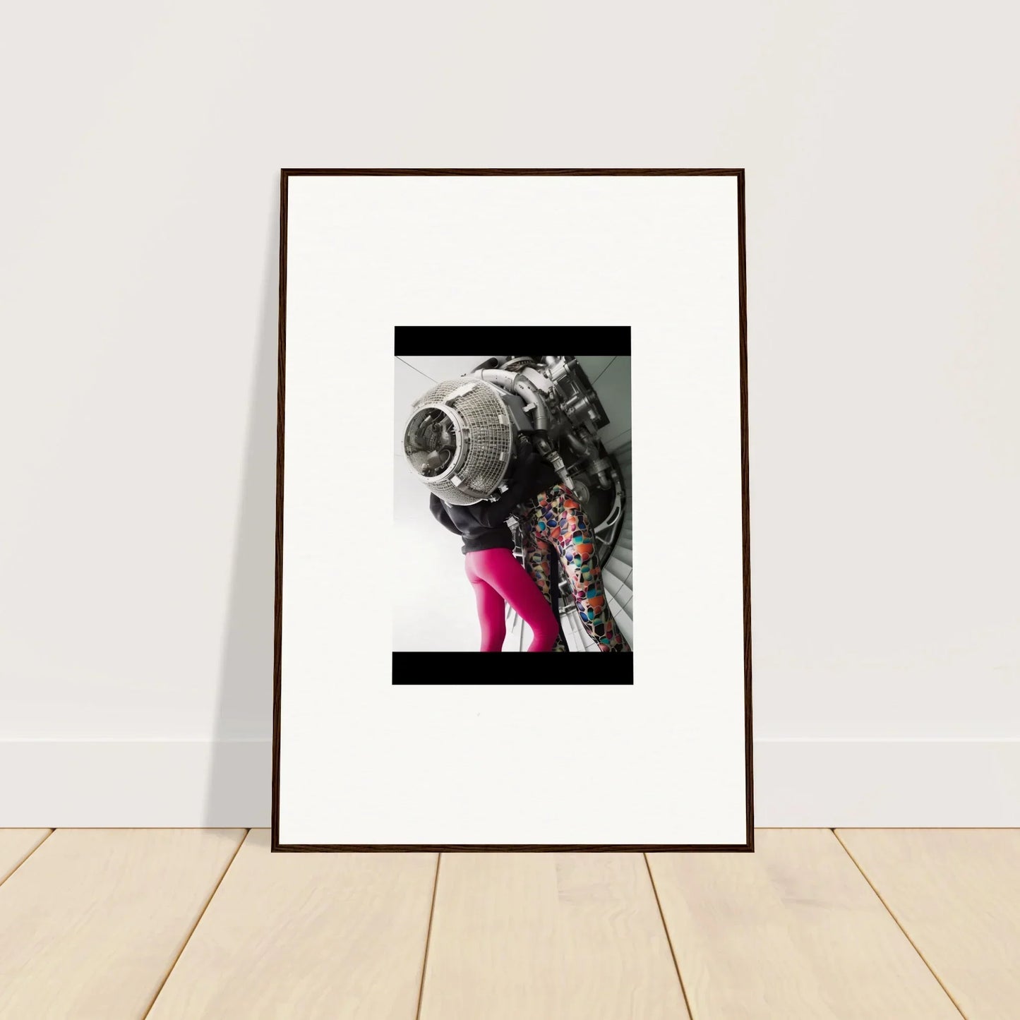 Framed black and white Magneto Embrace wall art with bright pink splash for stylish room decor