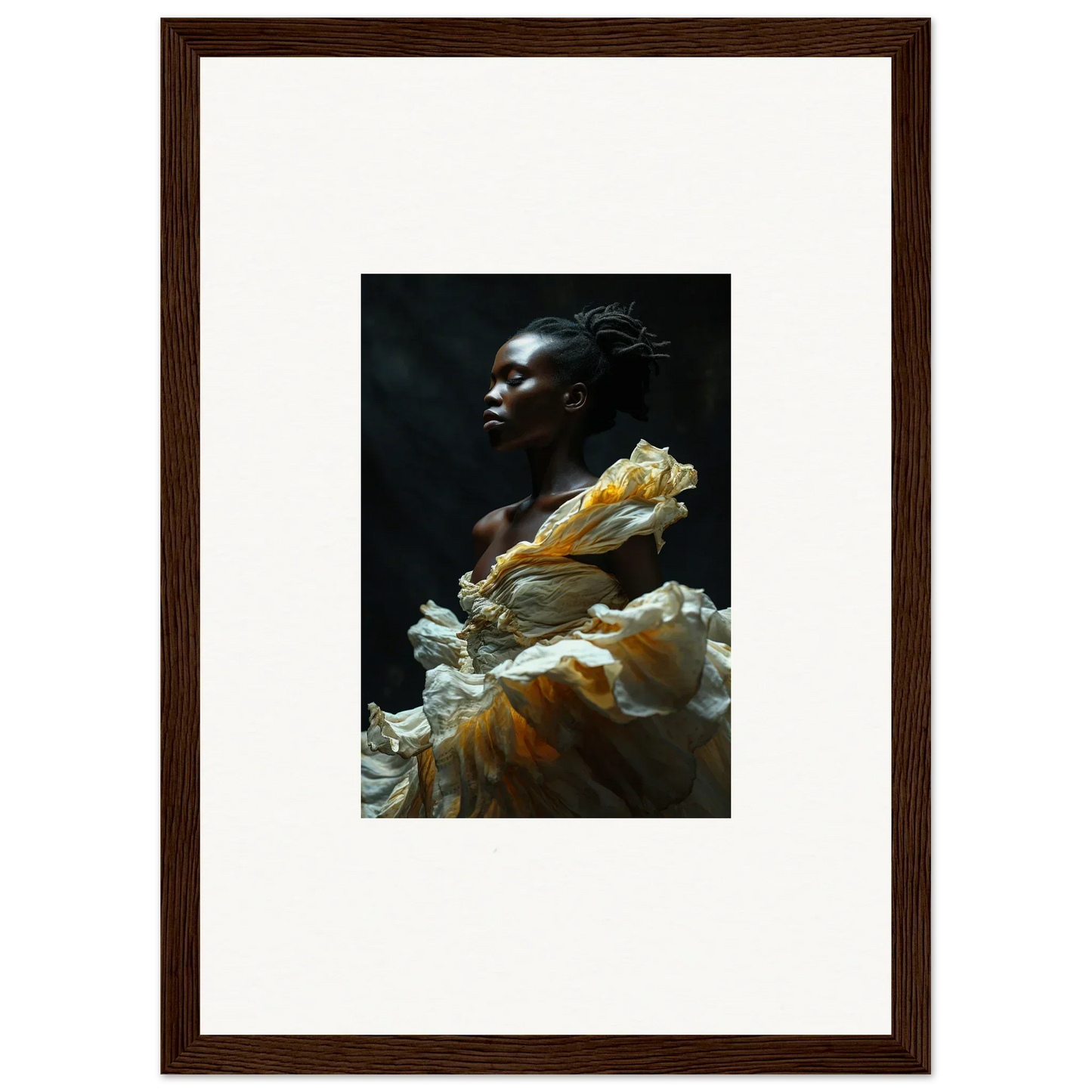 Portrait of a person with dark skin wearing a flowing yellow and white garment.