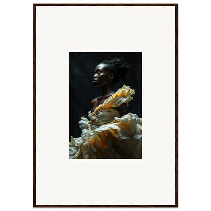 Portrait of a person with dark skin wearing a voluminous yellow and white garment.