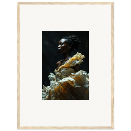 Portrait of a person wearing a dramatic ruffled yellow and white garment against a dark background.