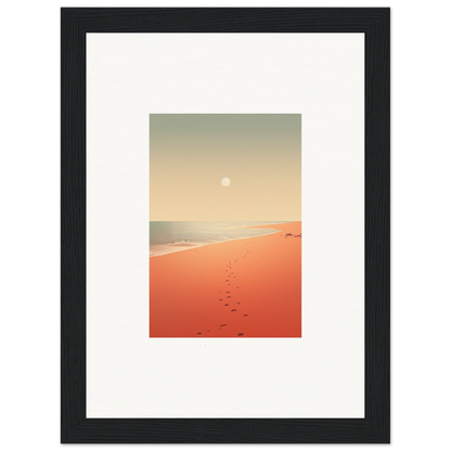 Framed wall art of a sunset beach scene with footprints and red horizons for room decor