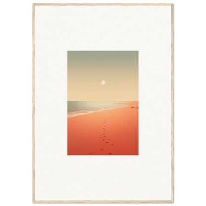 Framed wall art featuring footprints on a sandy beach at sunset with red horizons