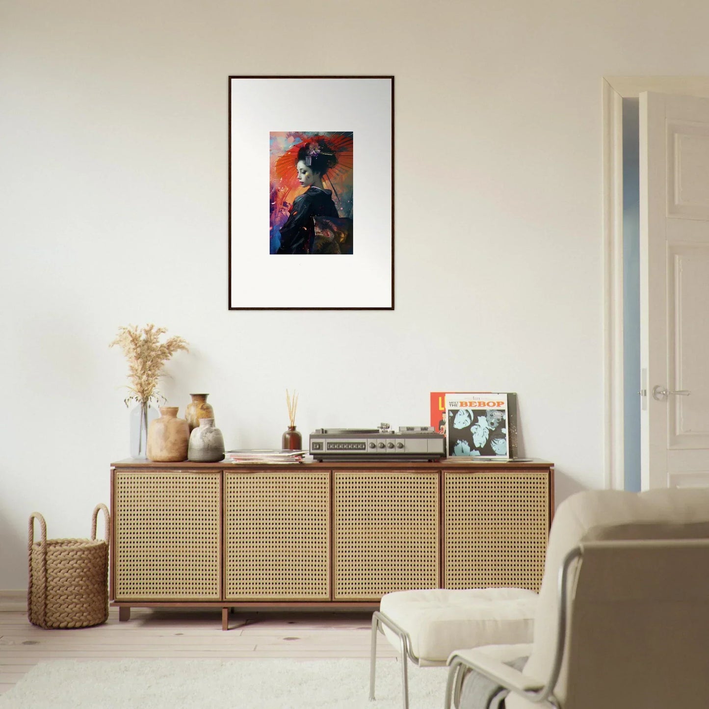 Rattan-fronted wooden sideboard with decorative items and a Canvas Print for Umbrella Dreams