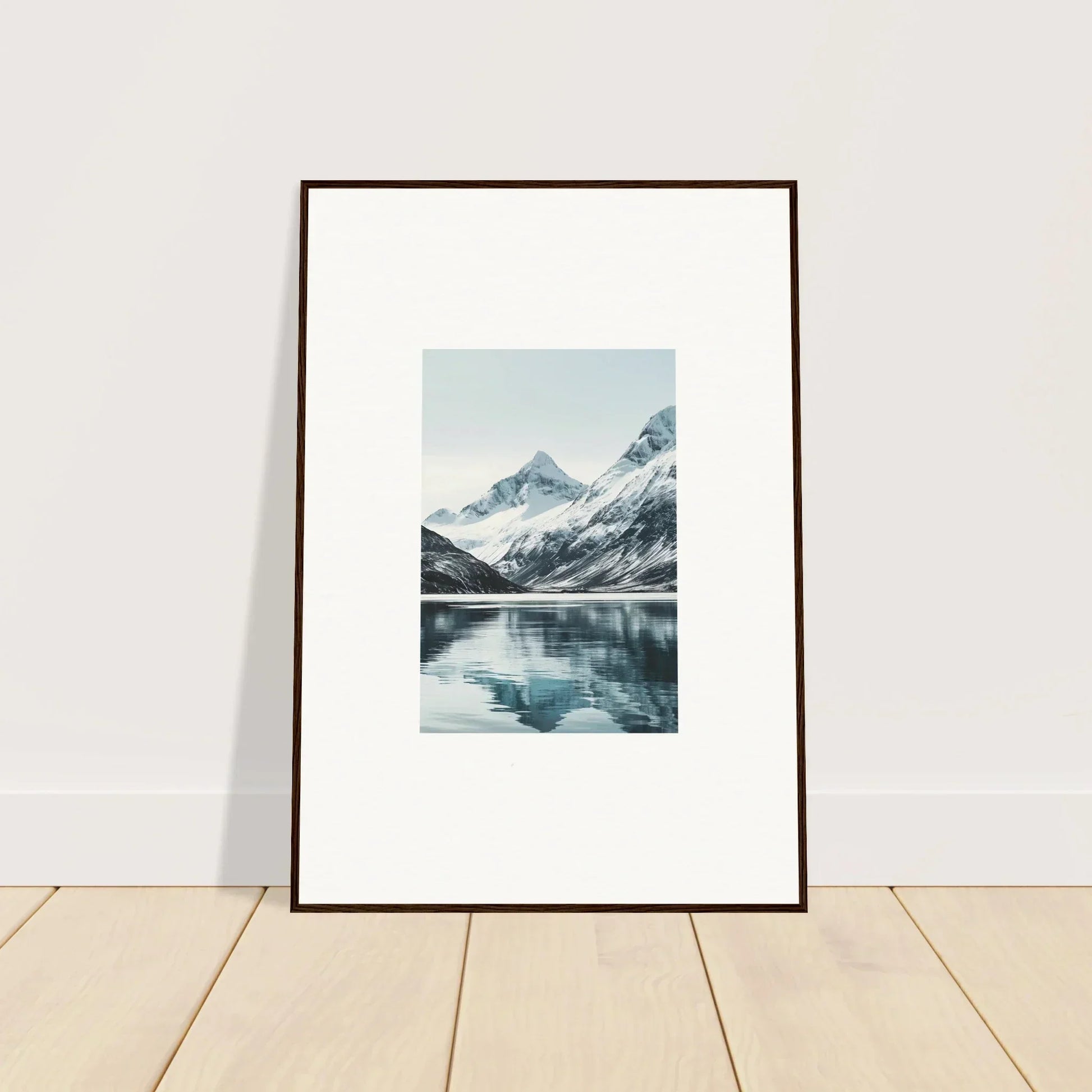 Framed canvas print of snow-capped mountains reflecting in a tranquil lake, perfect for room decoration