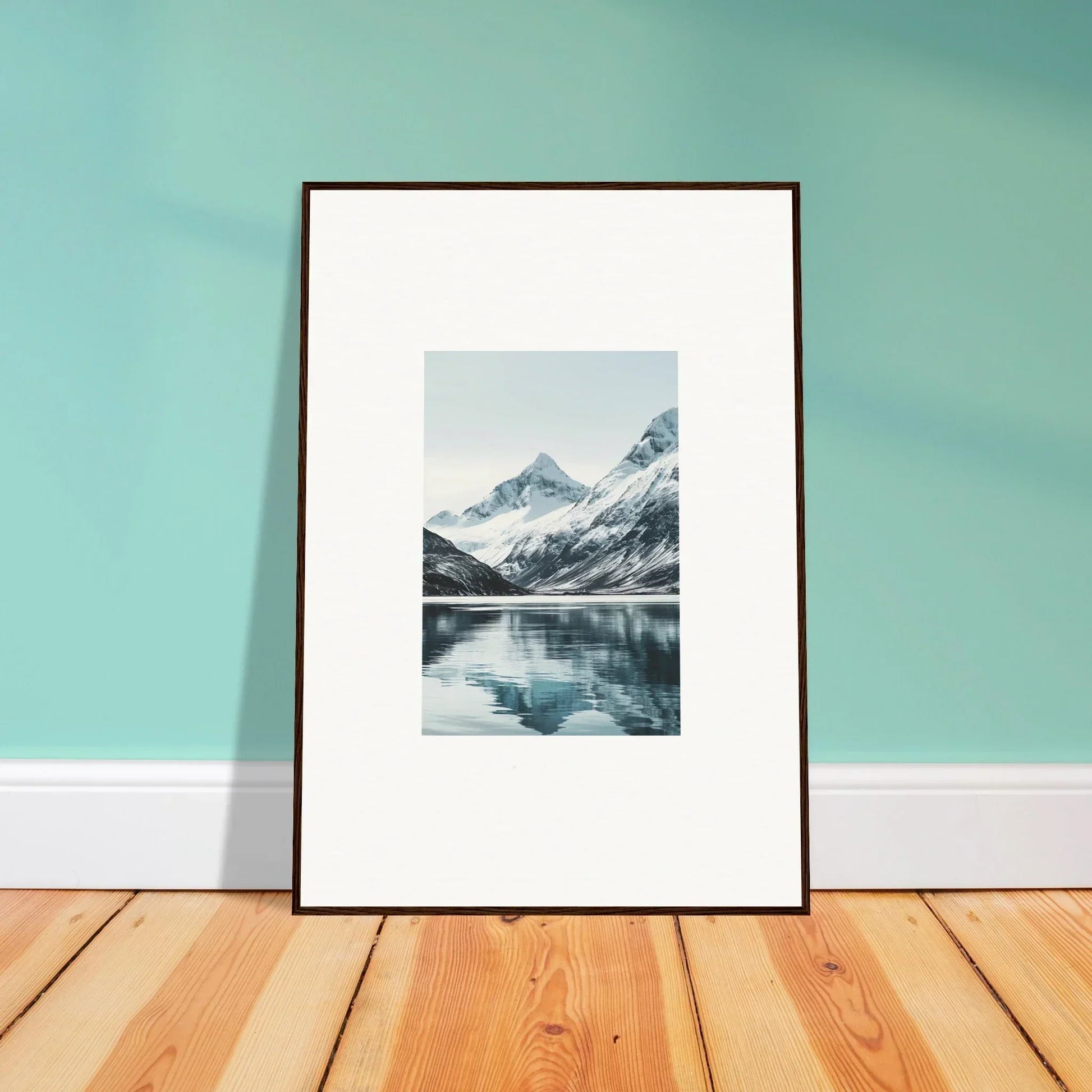 Framed canvas print of alpine echoes with a snow-capped mountain reflecting in a lake