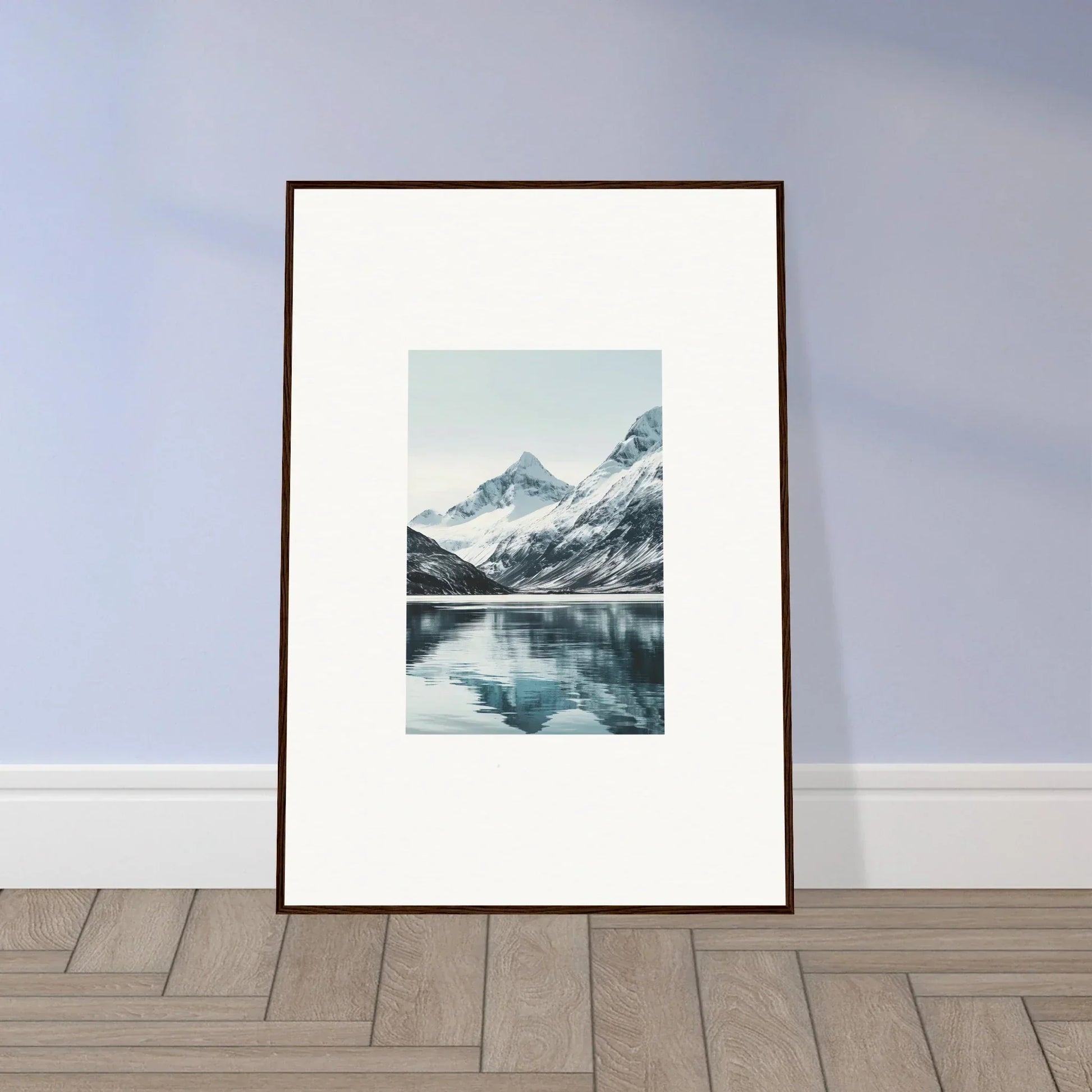 Framed canvas print of snow-capped mountains reflecting on a lake for room decoration