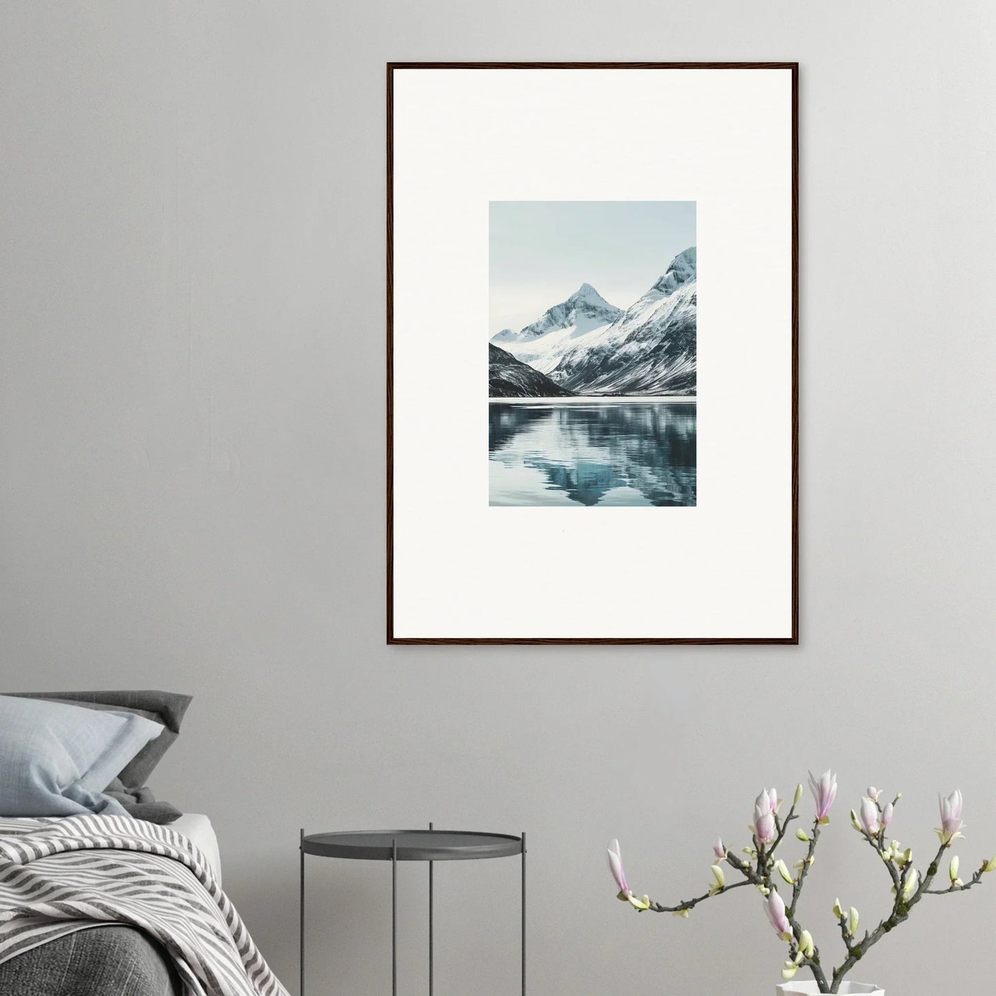 Framed canvas print of alpine echoes with a serene snow-capped mountain reflection