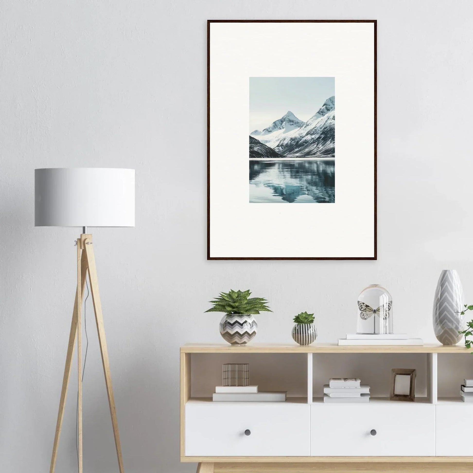 Framed canvas print of alpine echoes with snow-capped mountains and lake reflection