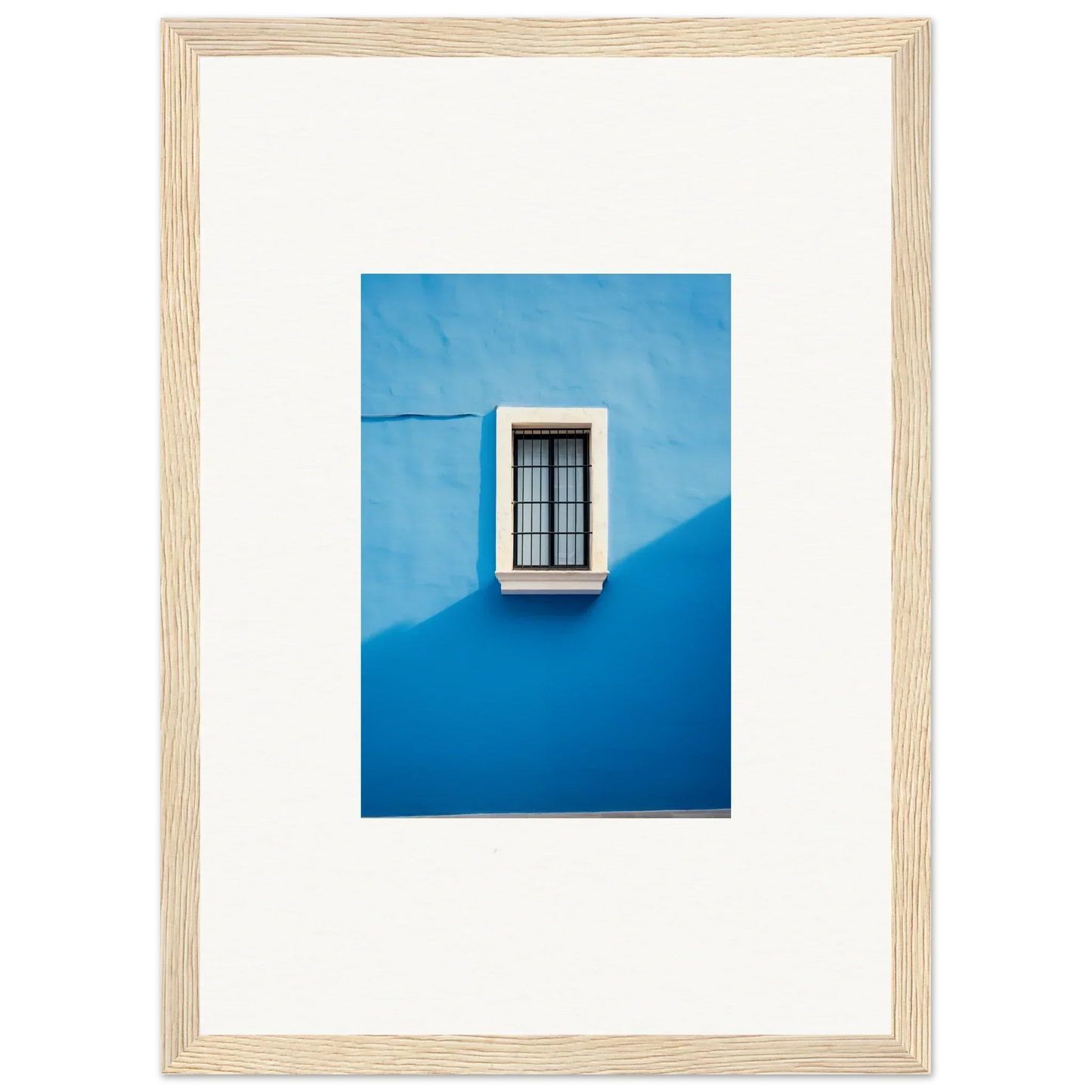 White-framed window with black bars on a blue wall from Reflective Cerulean Daydreams