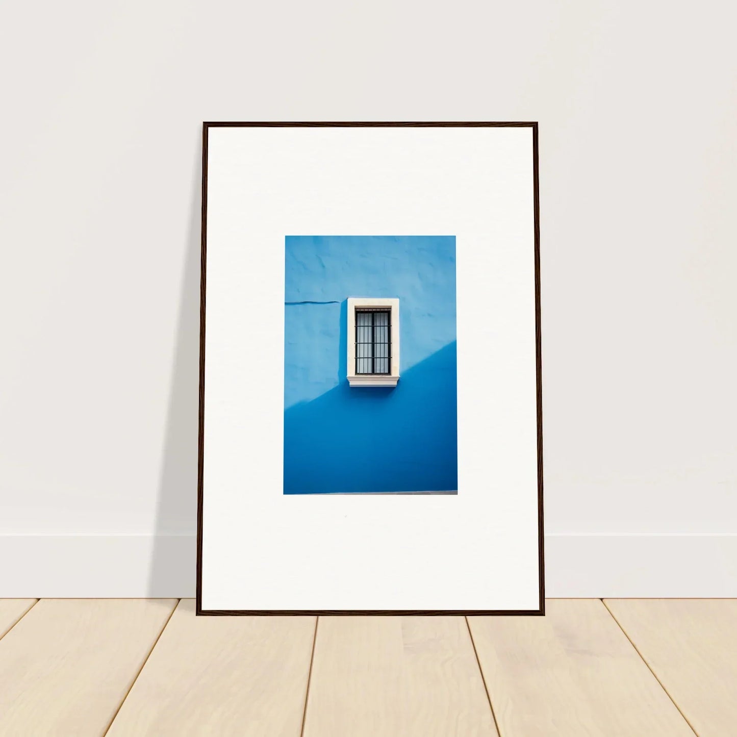 Framed photo of a window on a cerulean wall, part of Reflective Cerulean Daydreams