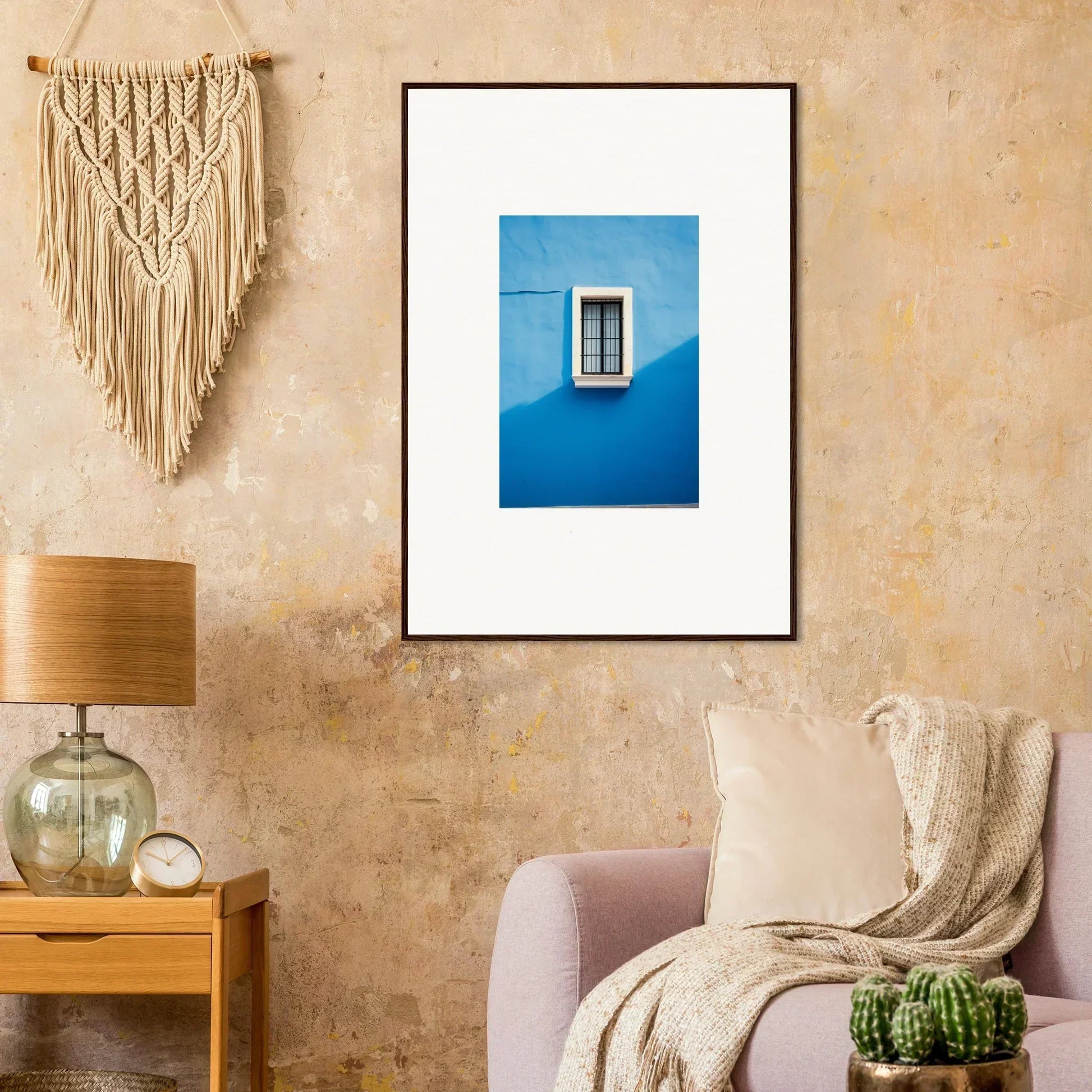 Framed photograph of a white window on a bright blue wall in Reflective Cerulean Daydreams