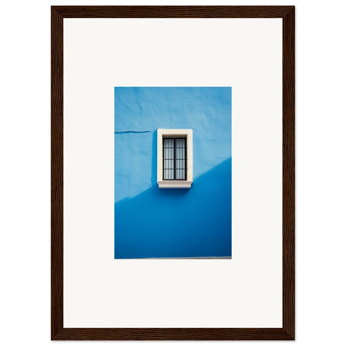 White-framed window with metal bars on bright blue wall from Reflective Cerulean Daydreams