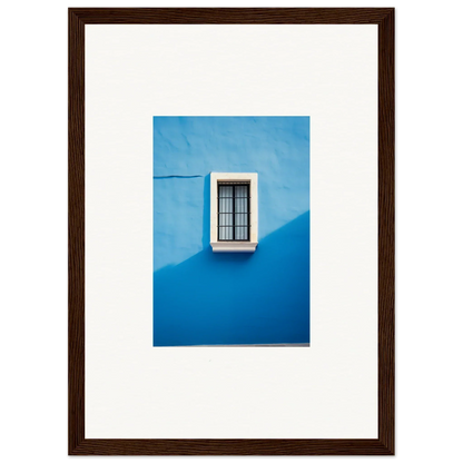 White-framed window with metal bars on bright blue wall from Reflective Cerulean Daydreams