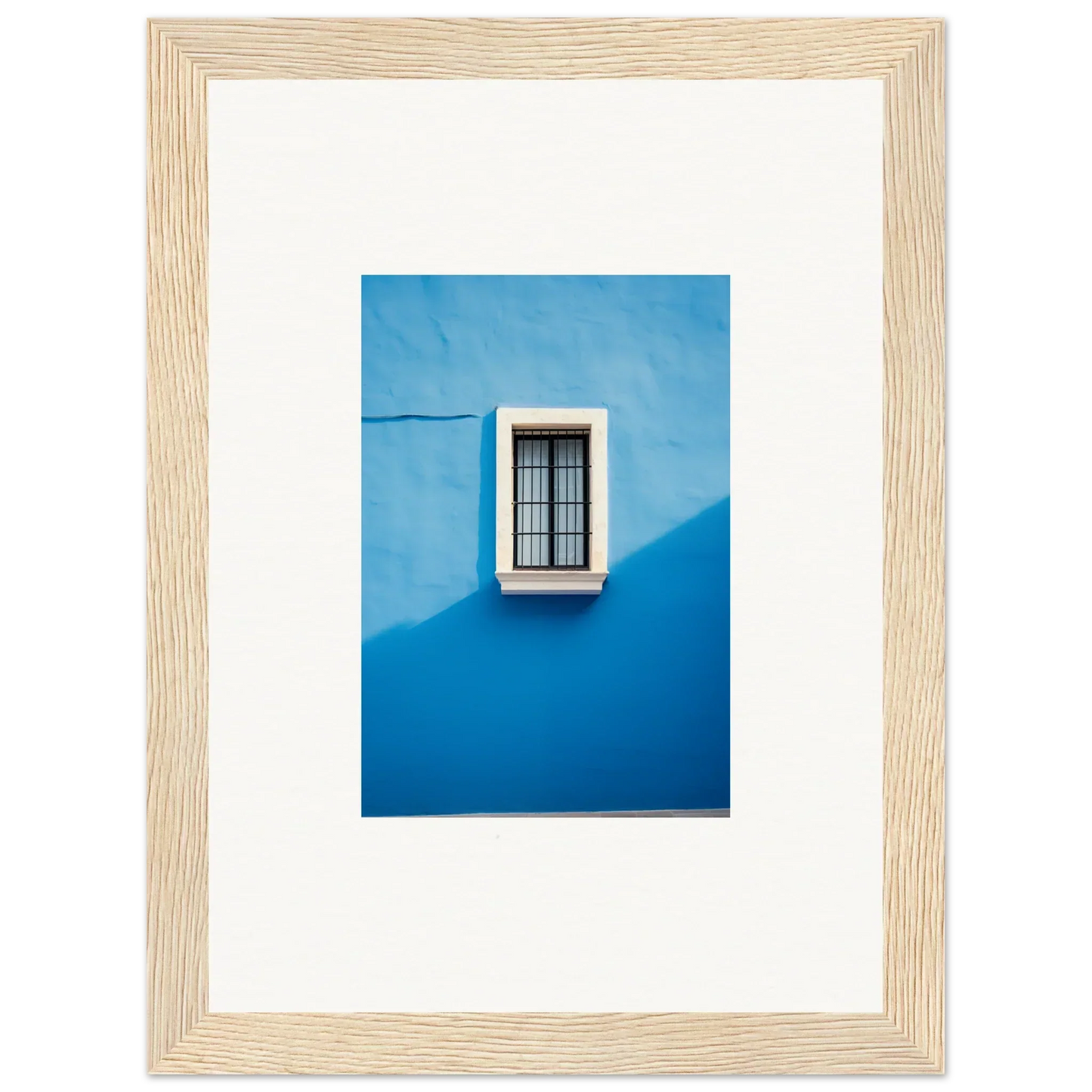 White-framed window with black bars on a blue wall in Reflective Cerulean Daydreams