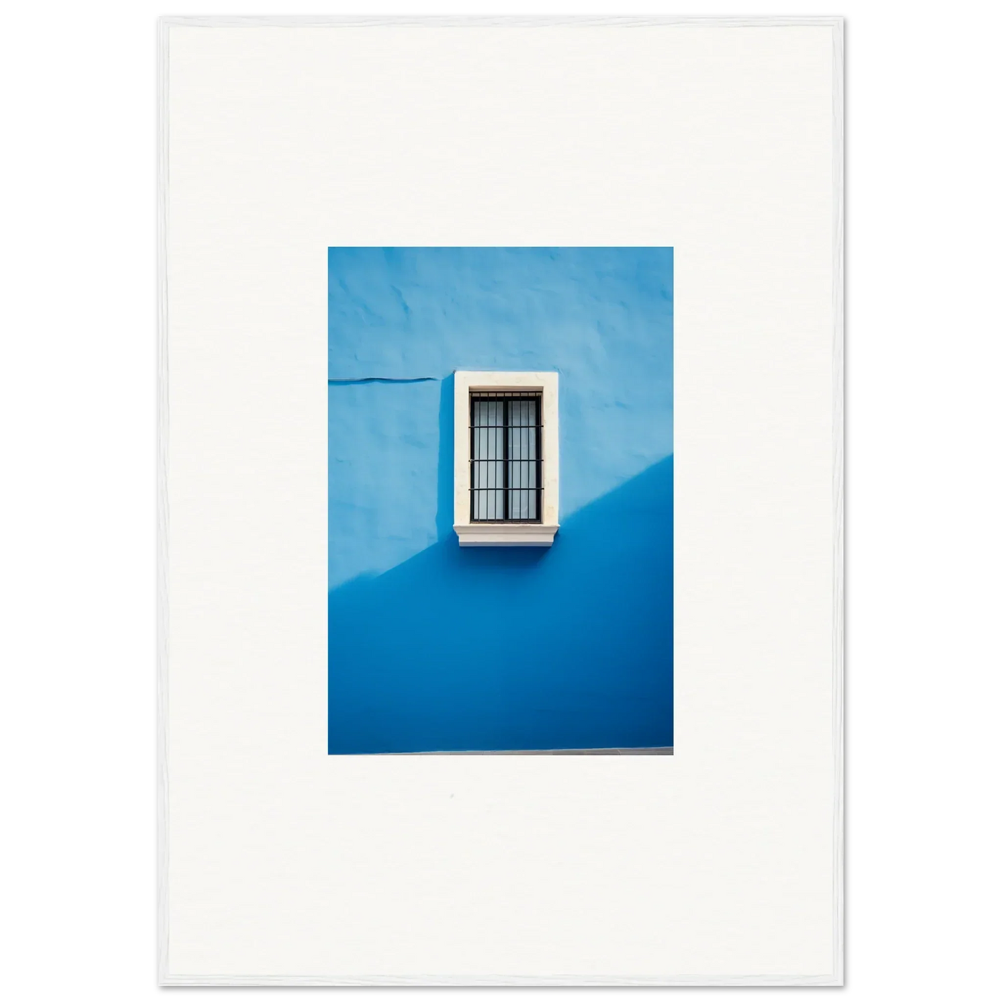 White-framed window with metal bars on blue wall in Reflective Cerulean Daydreams