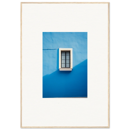 White-framed window with bars against a bright blue wall in Reflective Cerulean Daydreams