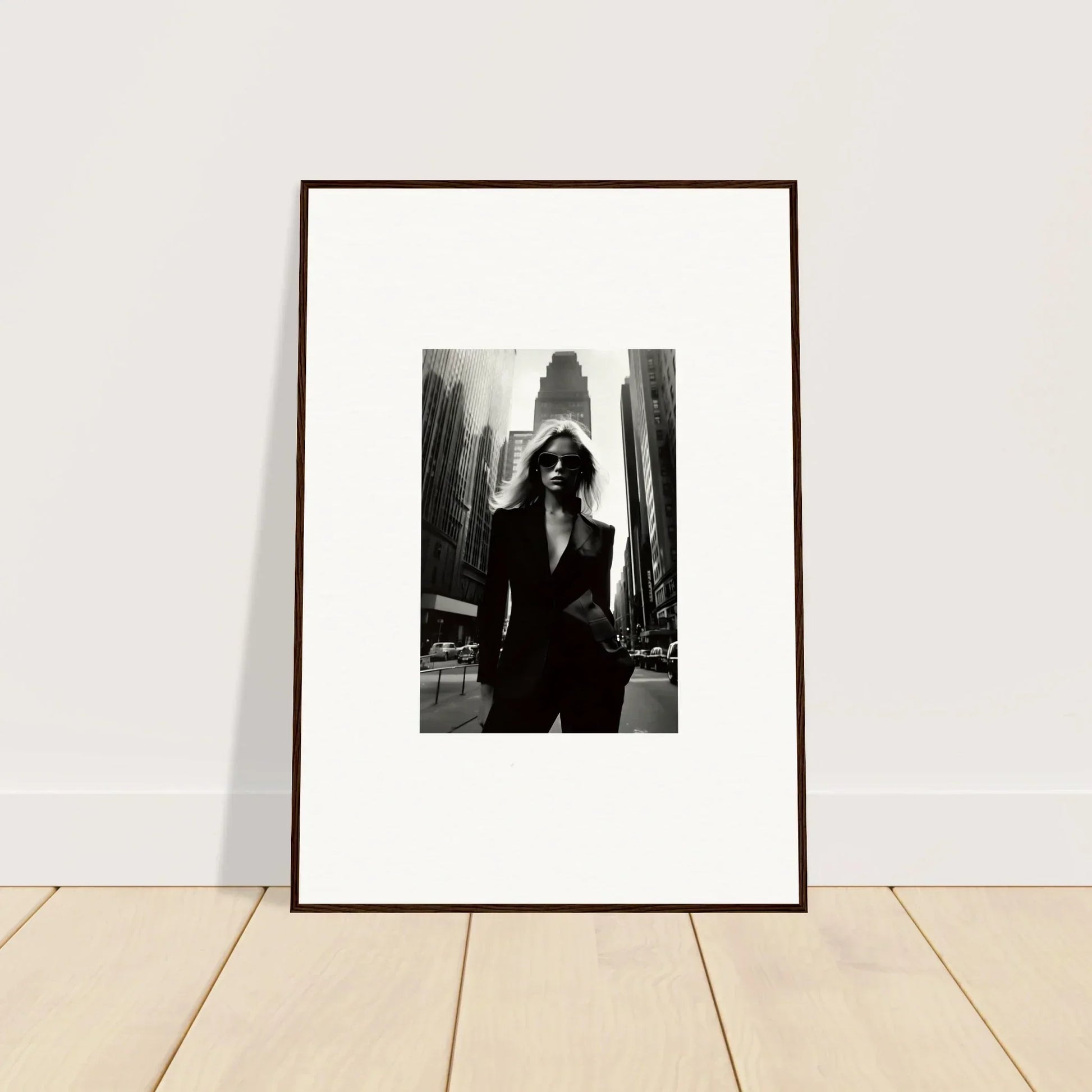 Framed black and white photograph of urbain chic person in sunglasses for room decor