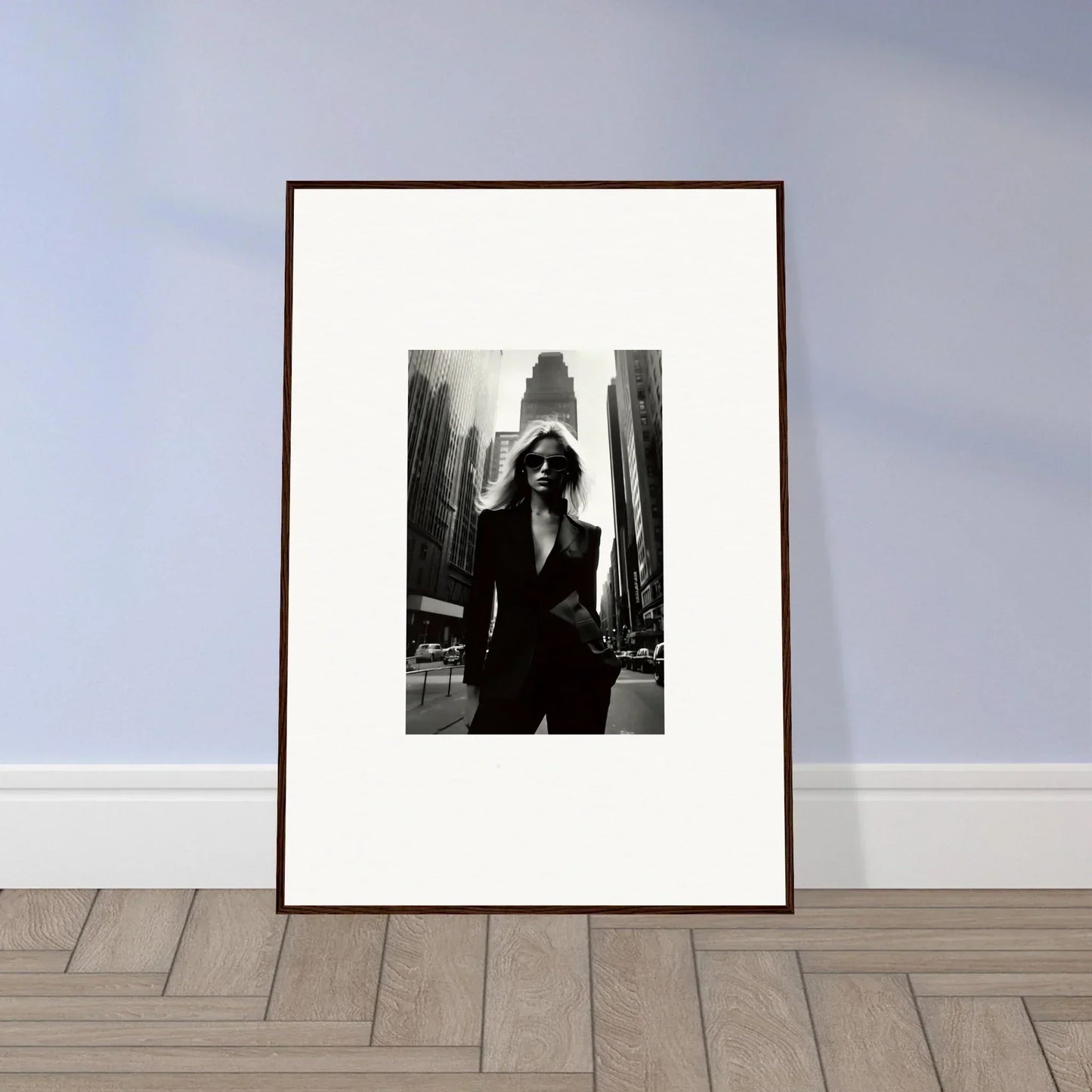 Framed black and white wall art of a stylish figure in a suit for urbain chic room decor