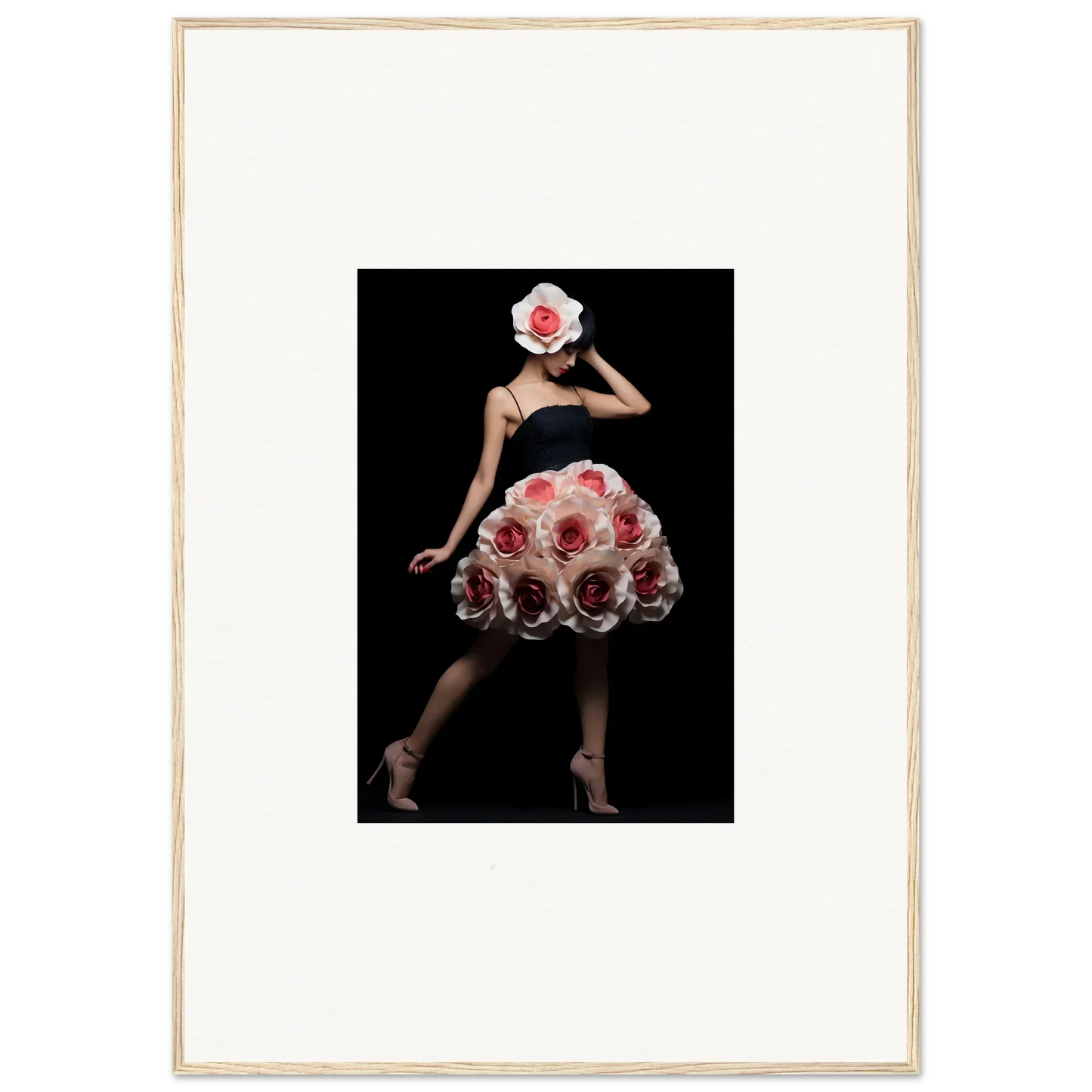 A figure wearing a dress and hat adorned with red roses against a dark background.