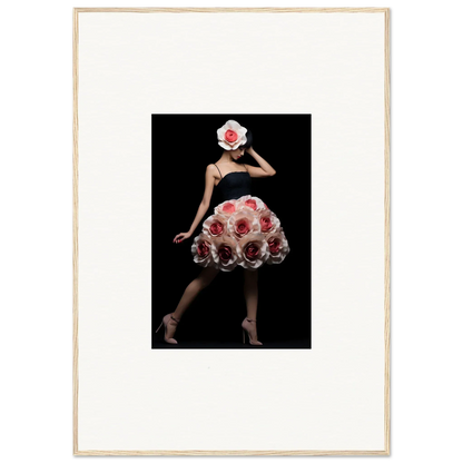 A figure wearing a dress and hat adorned with red roses against a dark background.