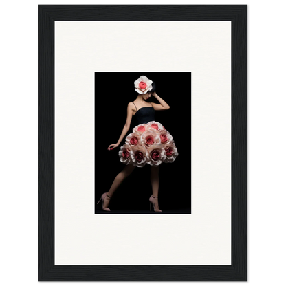 Framed artwork depicting a figure in a floral-inspired dress and headpiece against a dark background.