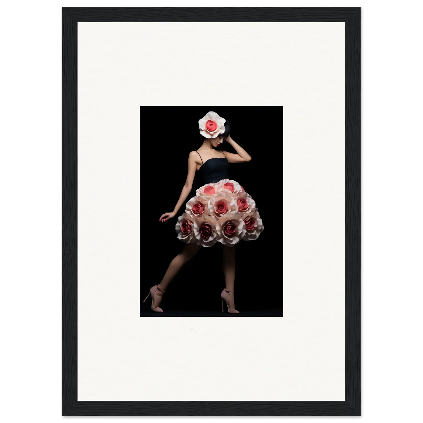 Framed artwork depicting a figure in a floral-inspired dress and headpiece against a dark background.