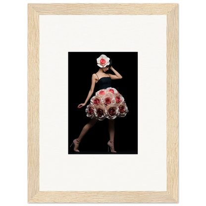 Framed artwork depicting a figure in a floral-inspired dress and headpiece against a dark background.