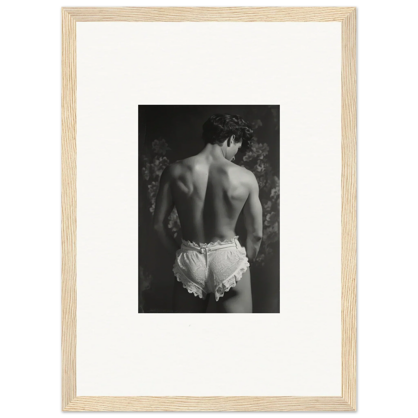 Stylish black and white photo of a shirtless person in white shorts for Lingerie Quantum decor