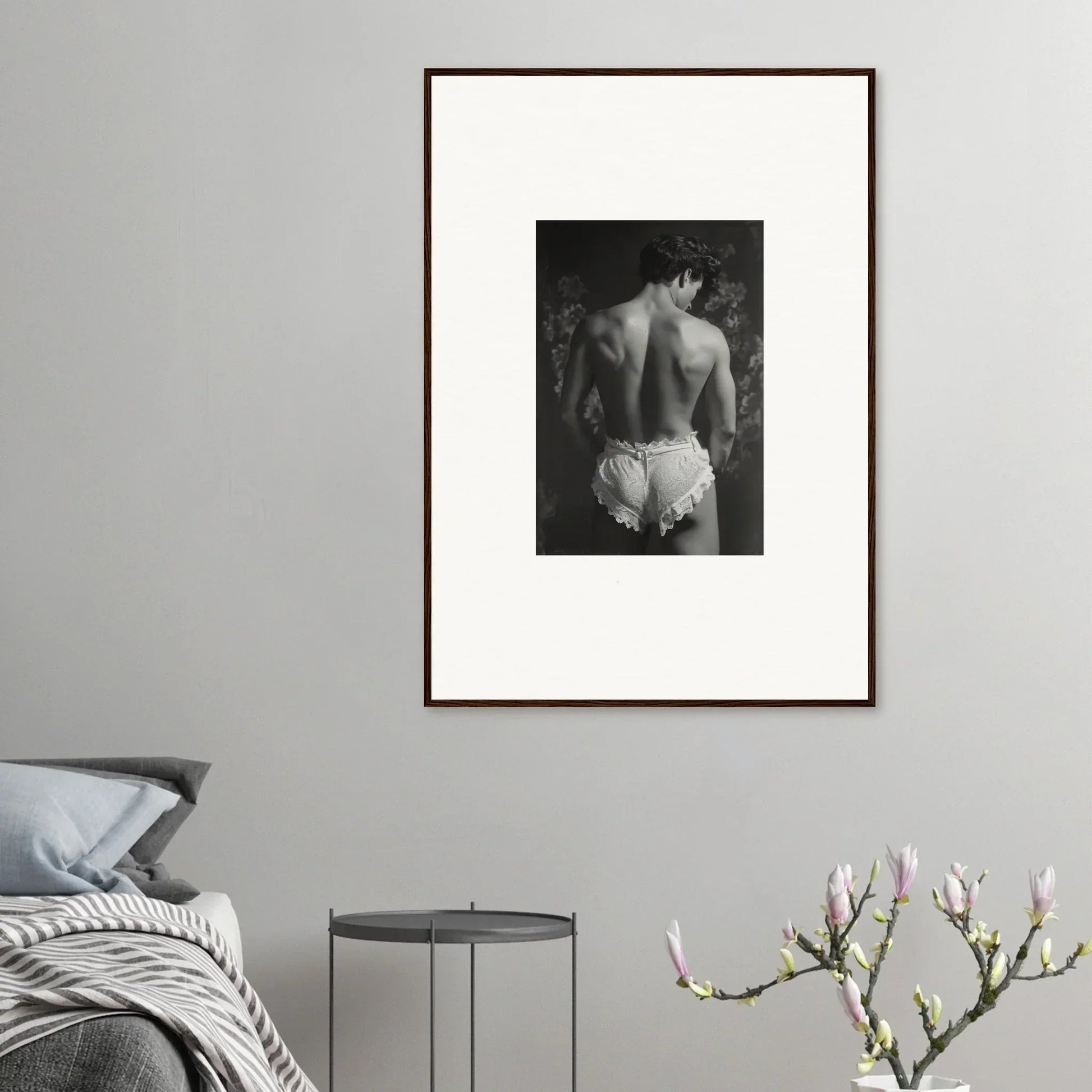 Framed black and white canvas print of a person in white underwear for unique room decoration