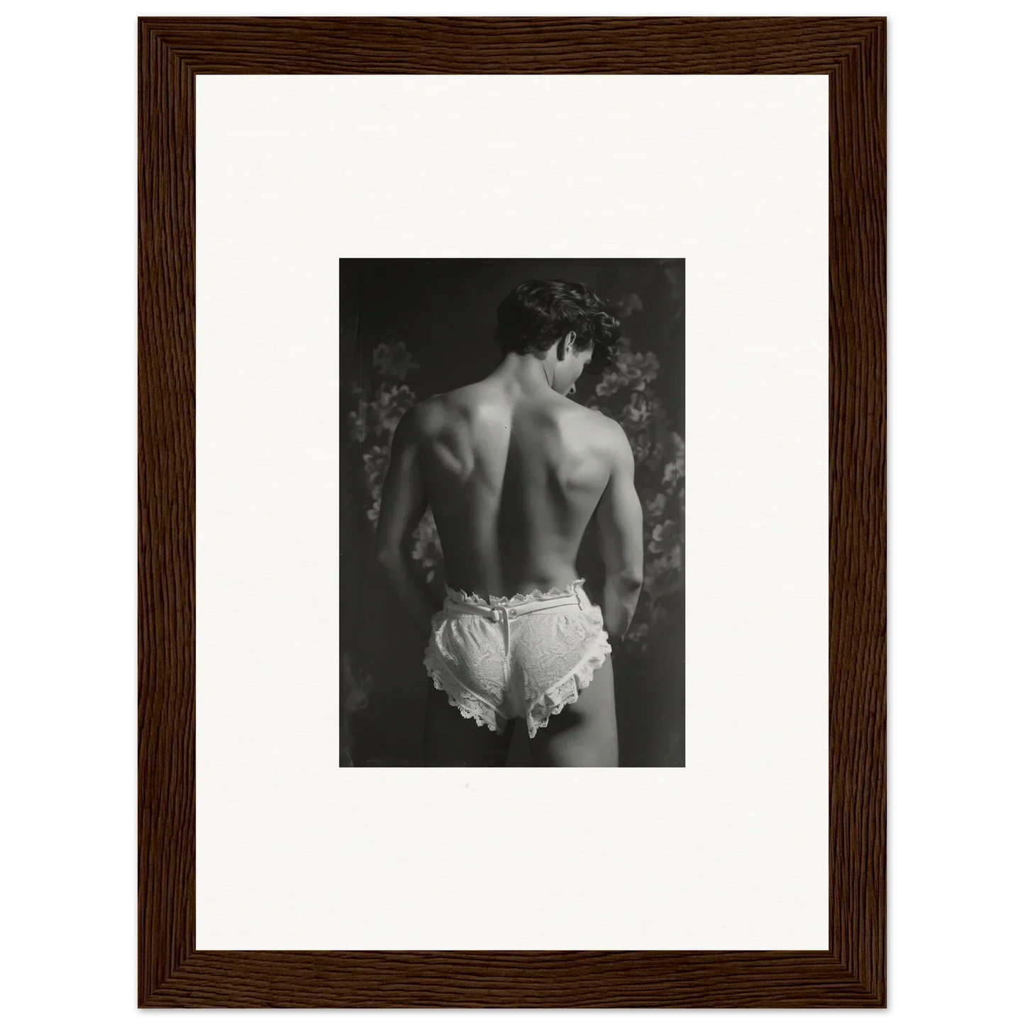 Black and white photo of a shirtless back in white ruffled underwear for Lingerie Quantum canvas print