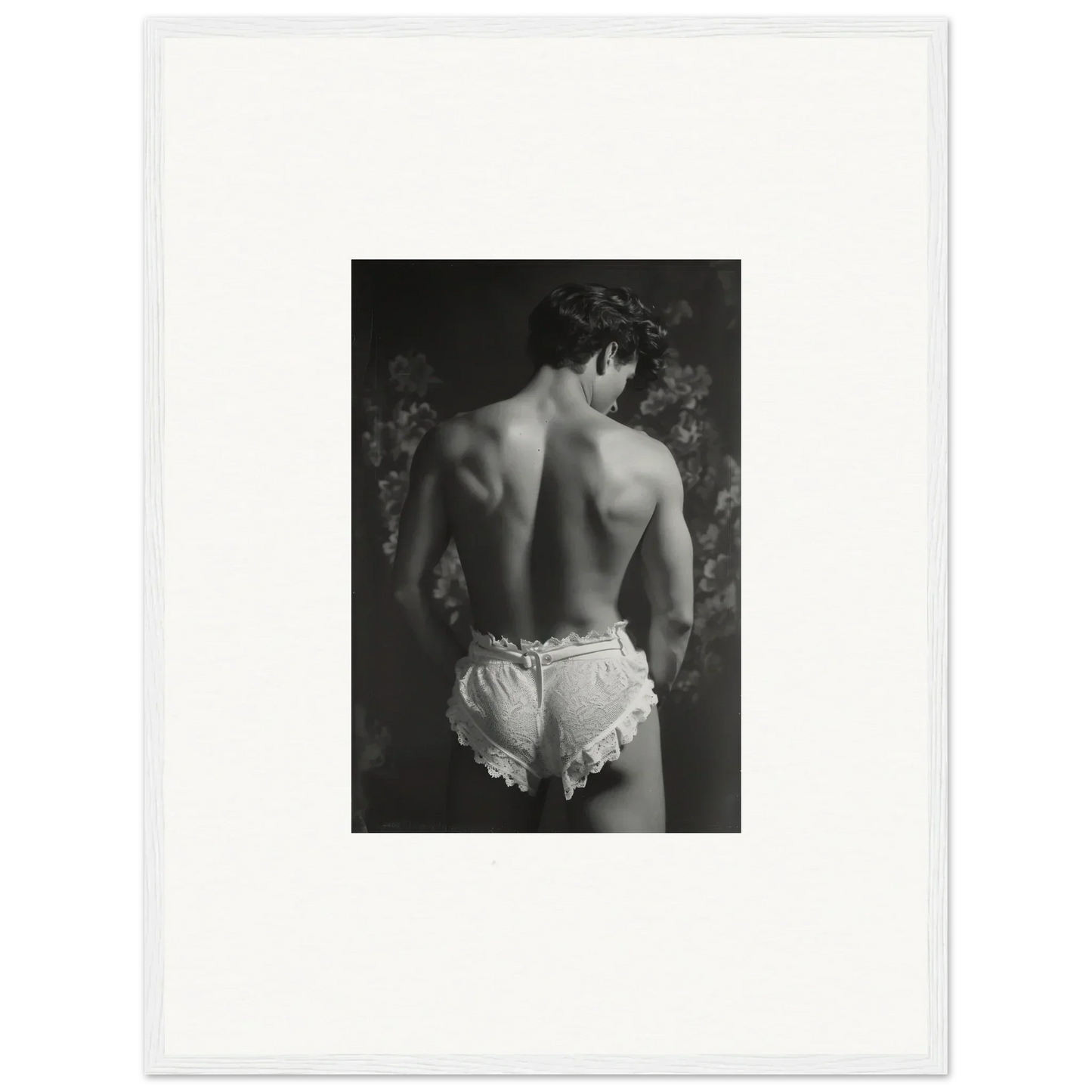 Black and white canvas print of a person’s bare back in White Ruffled Underwear