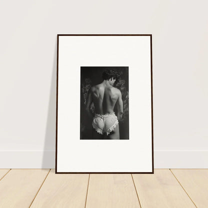 Framed black and white photo of a bare back, perfect for Lingerie Quantum room decoration