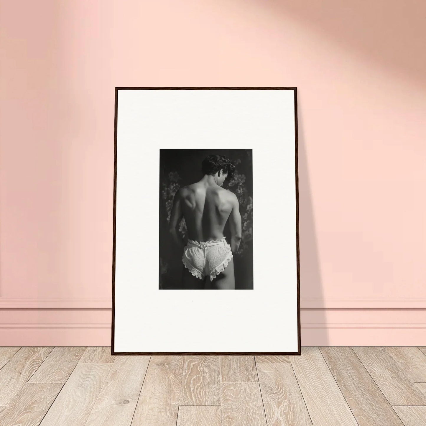 Framed black-and-white canvas print of a person in lace underwear for room decoration