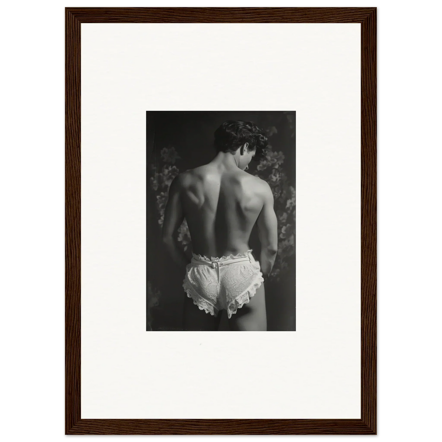 Black and white photo of a bare back in frilly white underwear for Lingerie Quantum decor