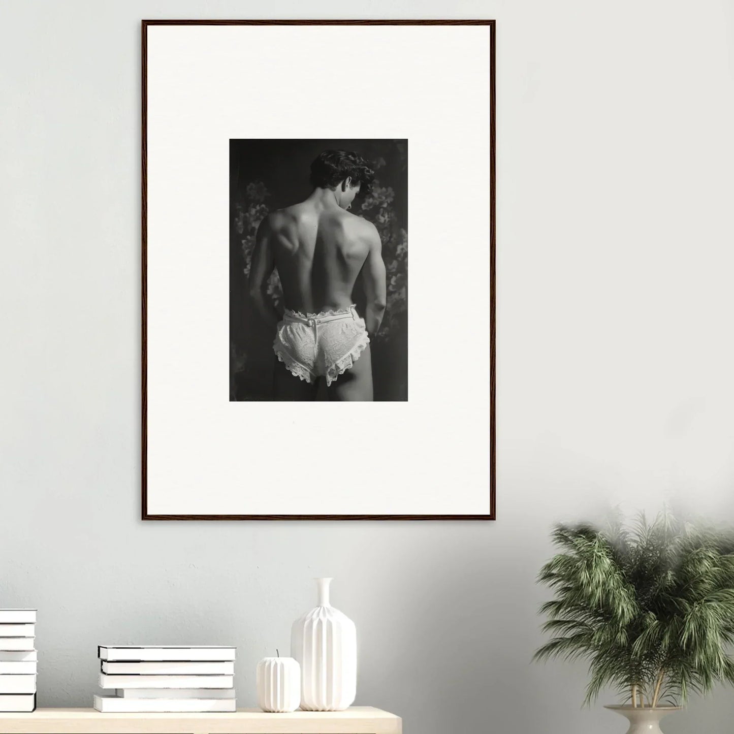 Framed black and white canvas print of a person in white underwear for room decoration